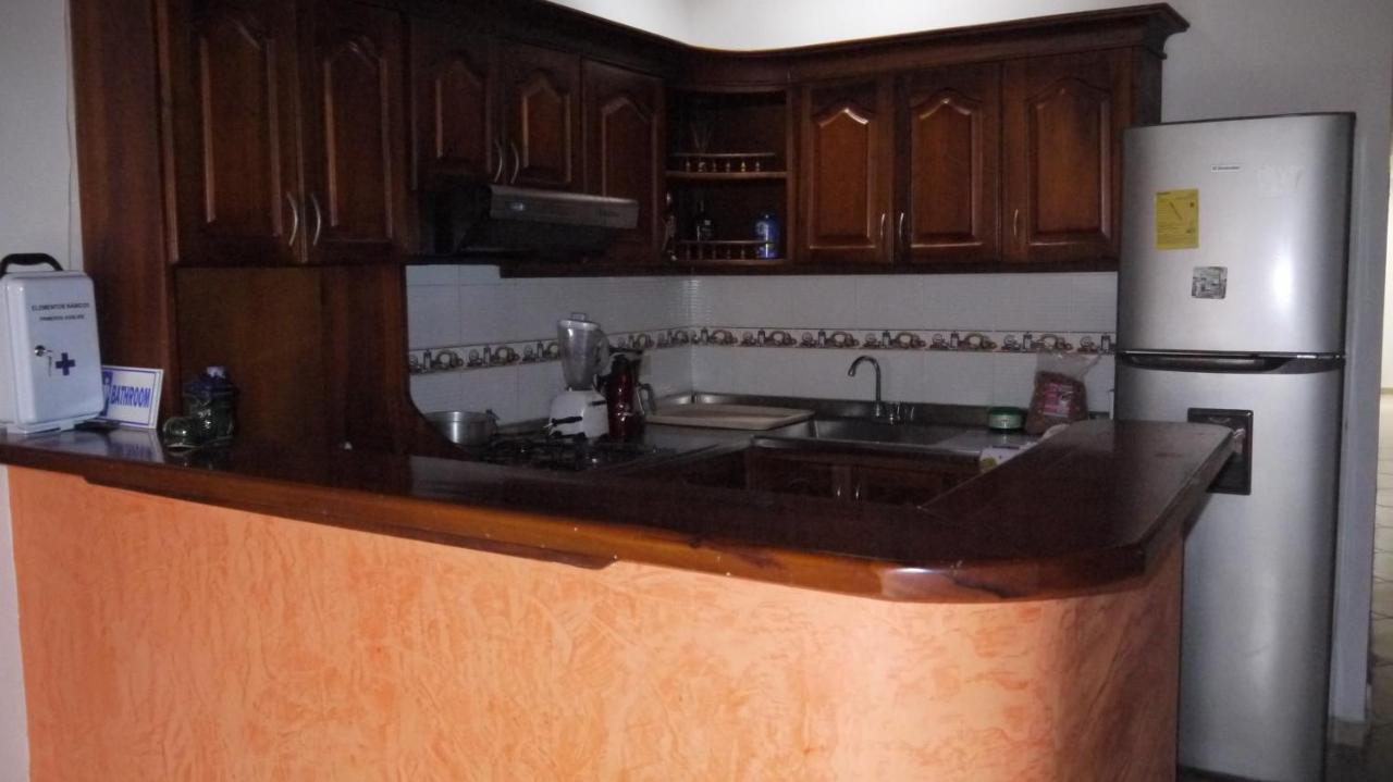 Hostal Naty Luna Jardin Bagian luar foto